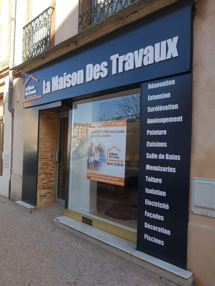 Habillage bleu de devanture avec enseigne et coordonnées